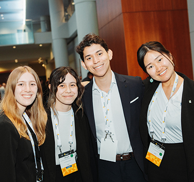 Group photo of four Enactus STU students in Toronto