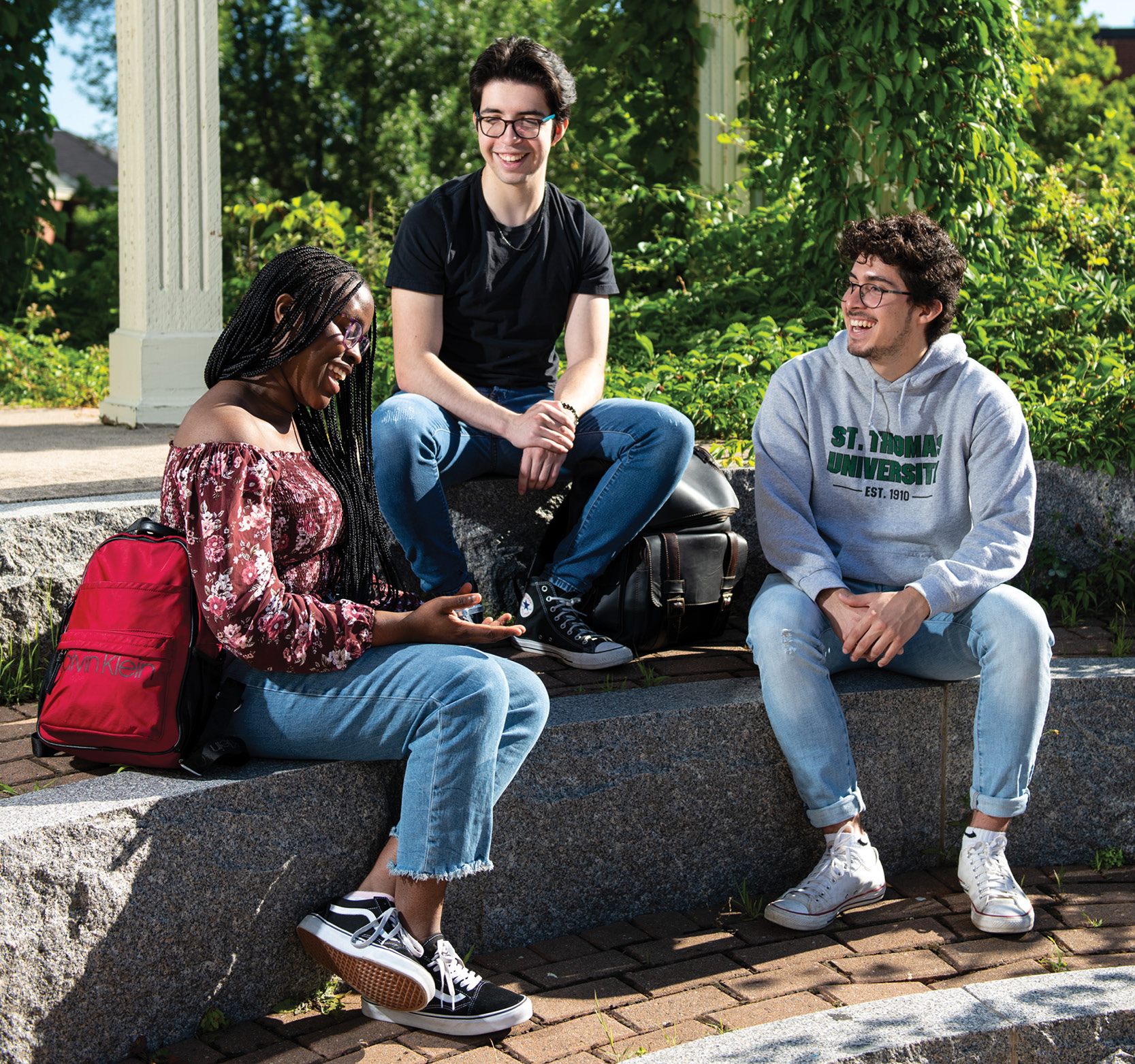 Students sitting in upper courtyard