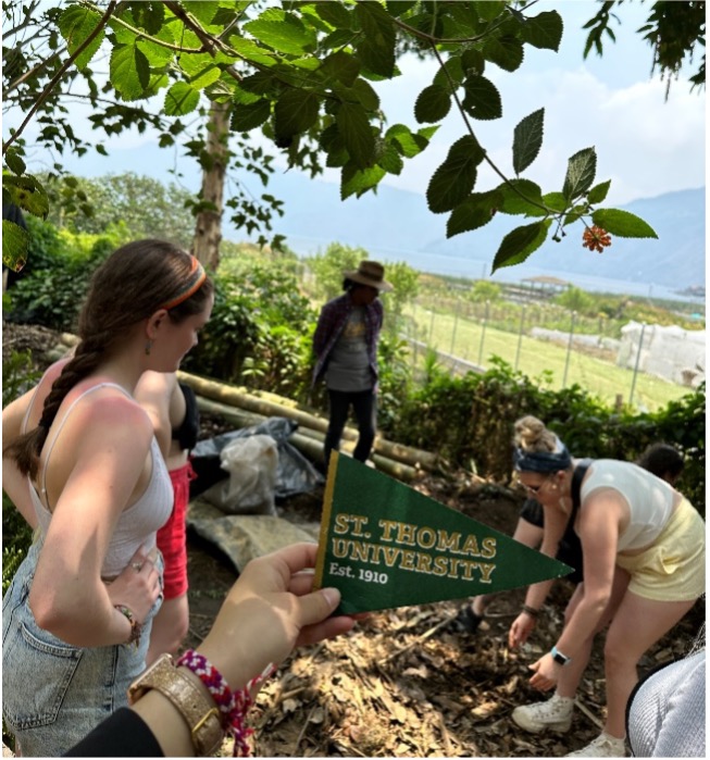 Students on experiential learning trip on a farm in Guatemala