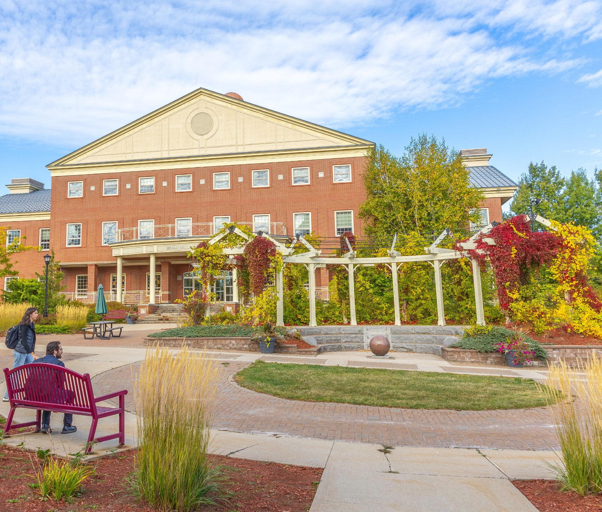 Brian Mulroney Hall and the pergola on a sunny fall day
